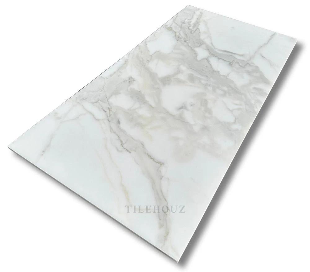 Calacatta Gold Marble 18x36 Tile, white with gray veining; polished &amp; honed by Tilehouz