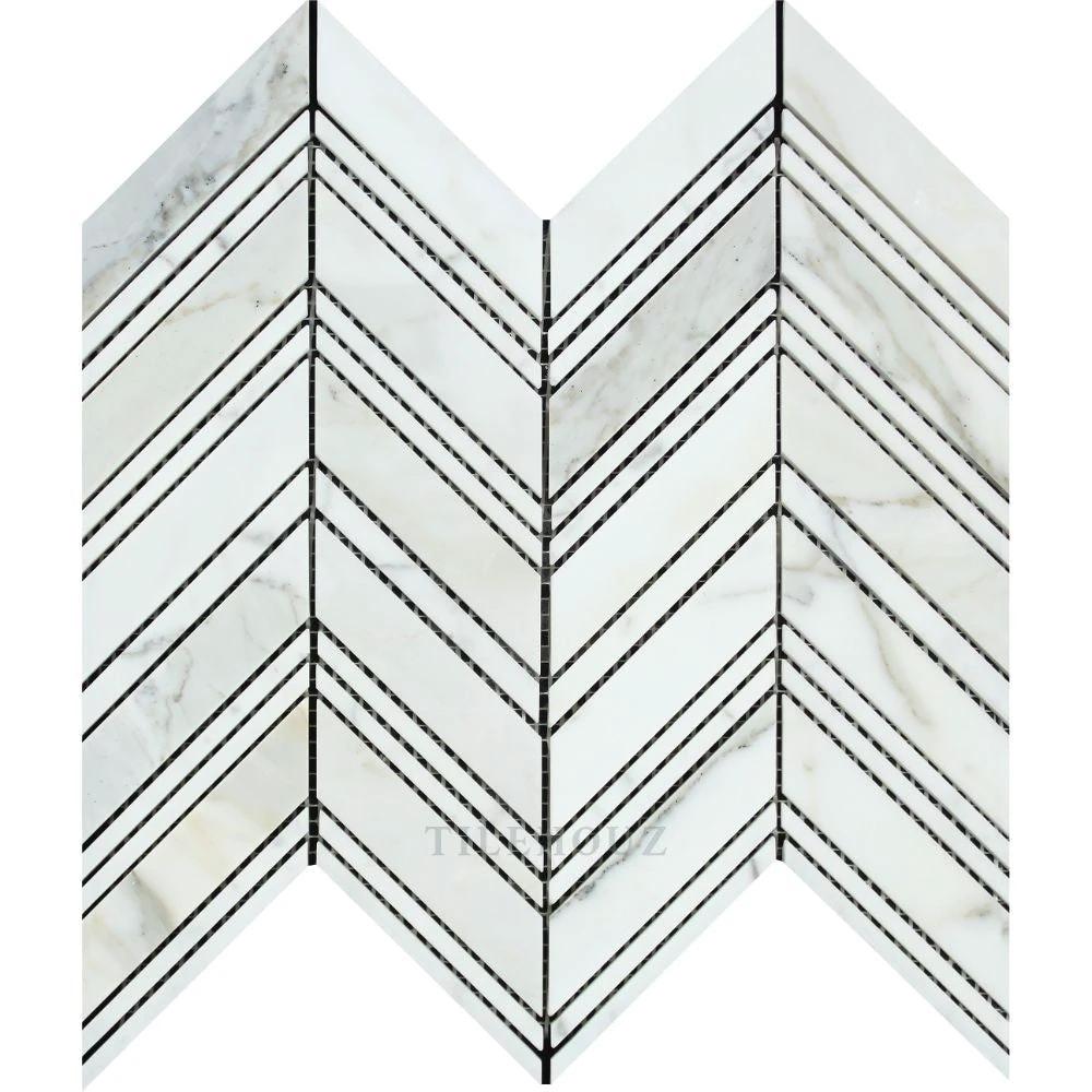 Tilehouz Calacatta Gold marble large chevron mosaic tile with black strip inlays, polished and honed.