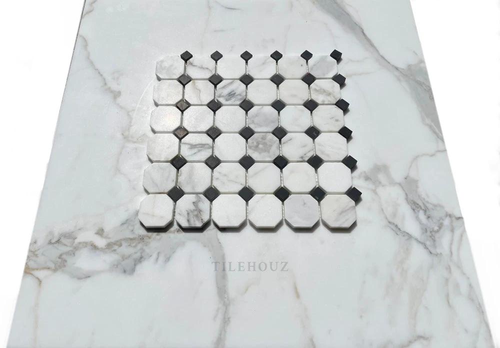 Calacatta Gold marble octagon mosaic with black dots by Tilehouz; white with gray veining, polished/honed wall tile