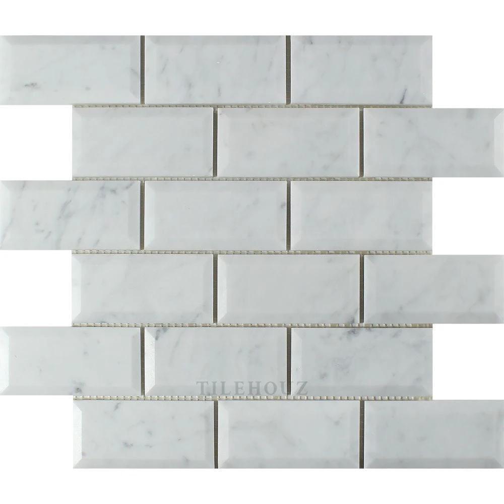 Carrara white marble 2x4 deep-beveled brick mosaic tile by Tilehouz, polished and honed for walls.