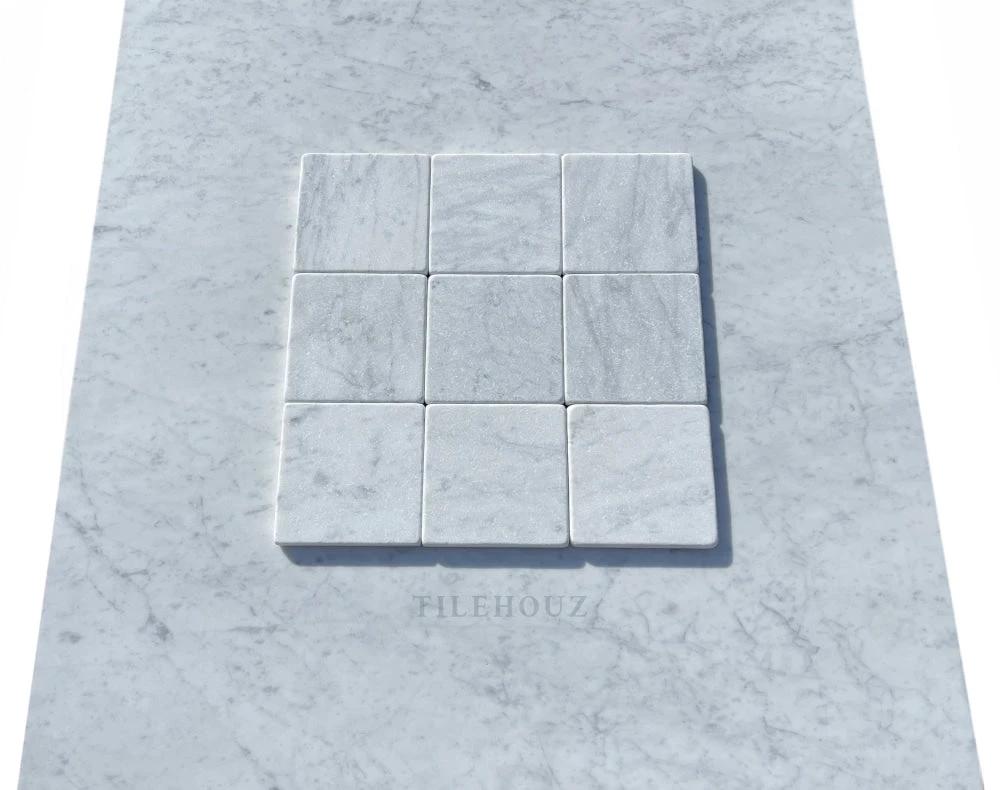 Carrara White Marble 4x4 Tumbled Tile mosaic, nine-tile by Tilehouz, white marble with grey veining