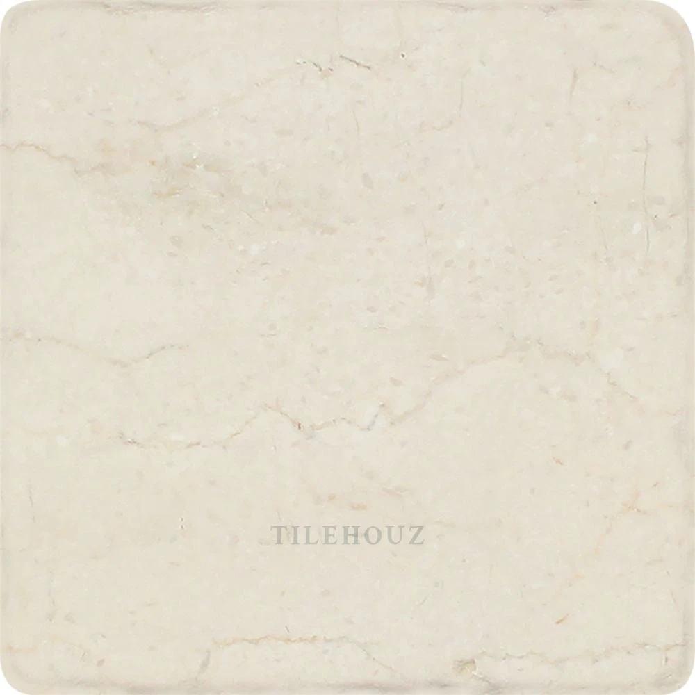 Crema Marfil 6x6 tumbled marble tile, beige with subtle veining, Tilehouz