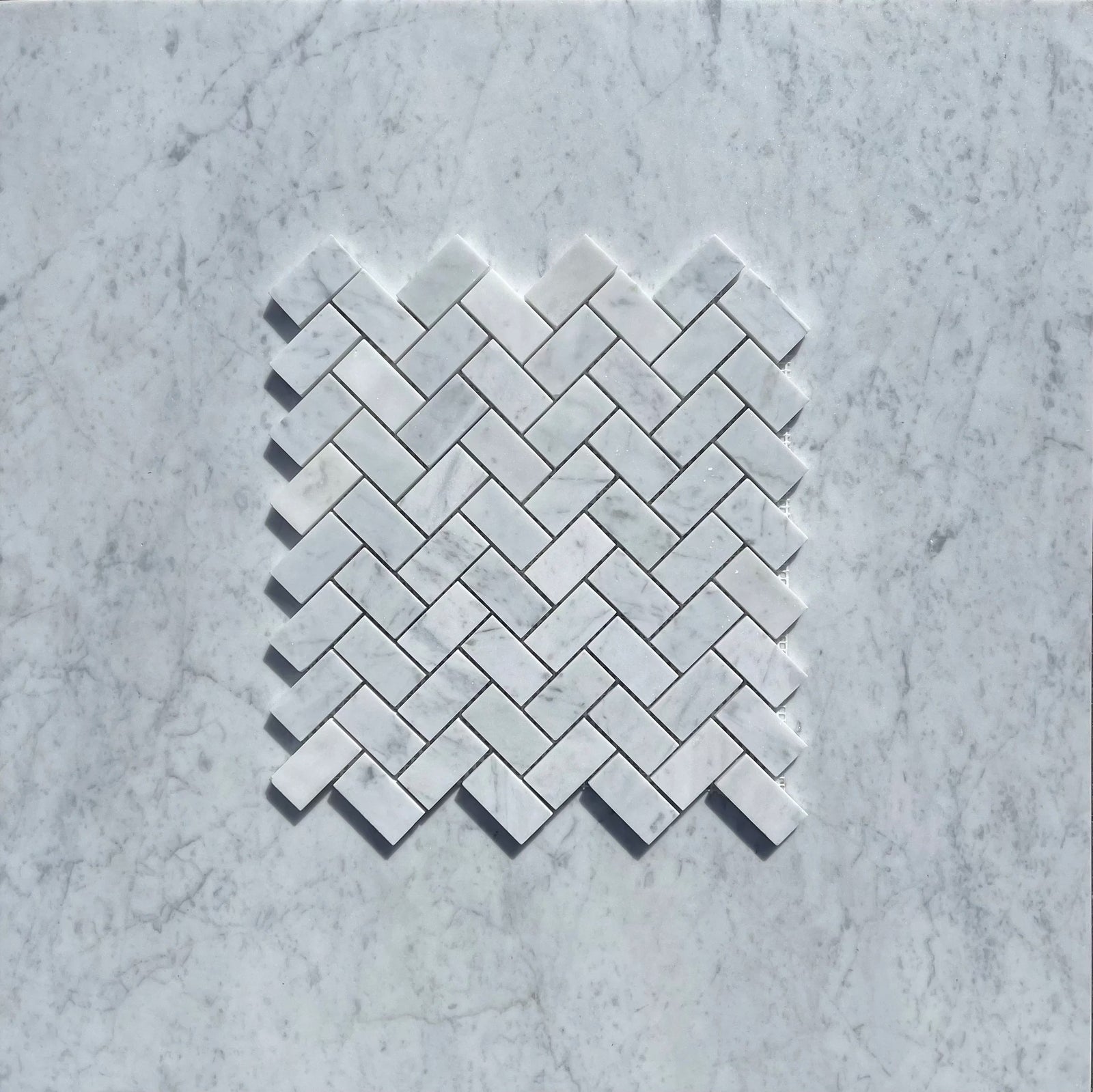 Carrara White Marble 1x2 Herringbone Mosaic Tile by Tilehouz, polished and honed wall & ceiling tile