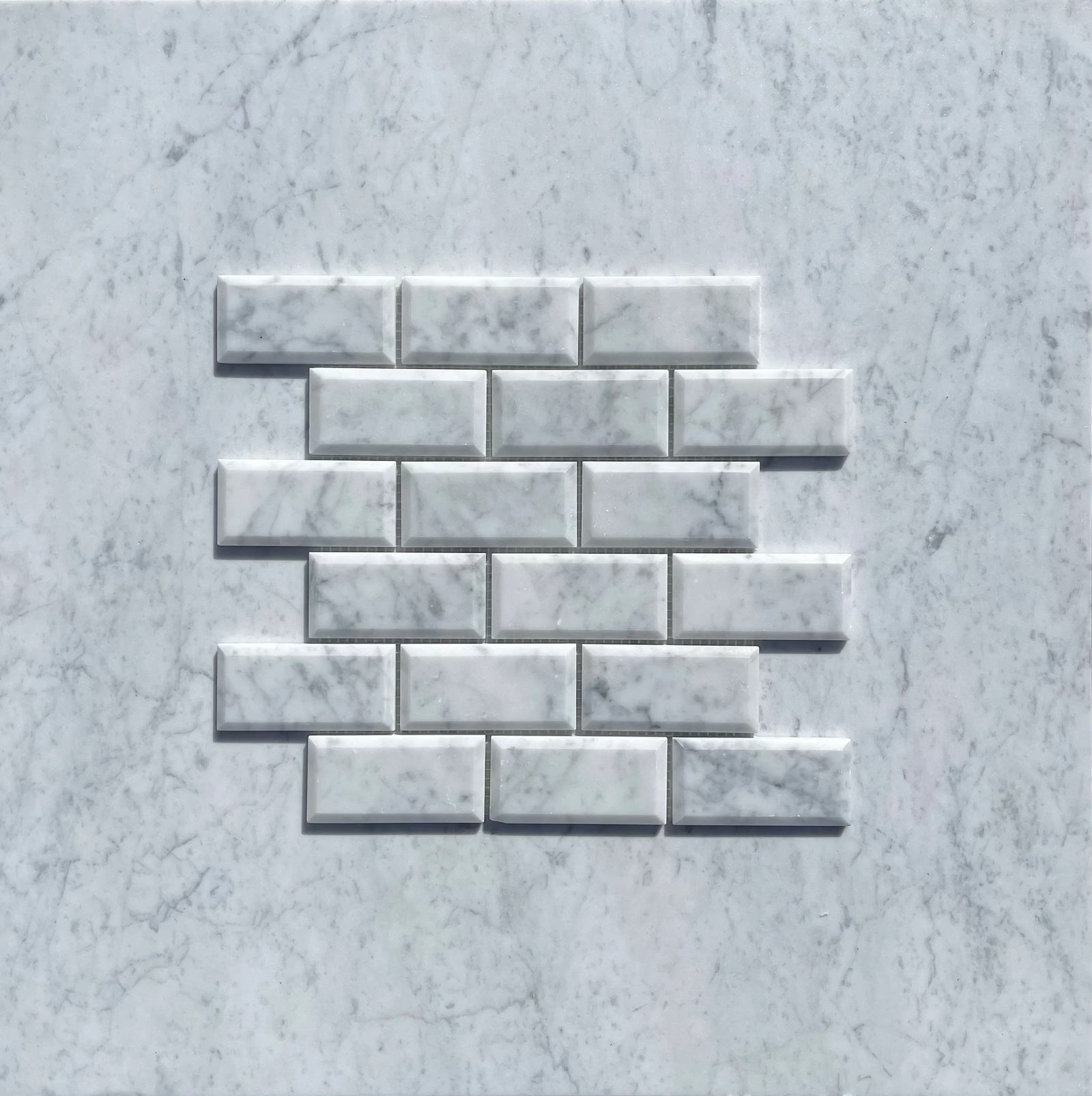 Carrara White Marble 2x4 deep-beveled brick mosaic tile for walls & ceilings by Tilehouz, polished & honed