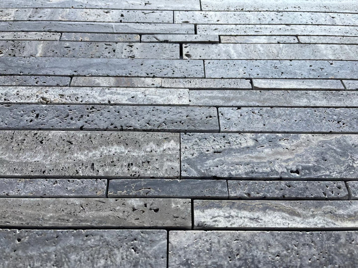 Blue travertine random-strip mosaic wall tile with brushed and semi-polished finish