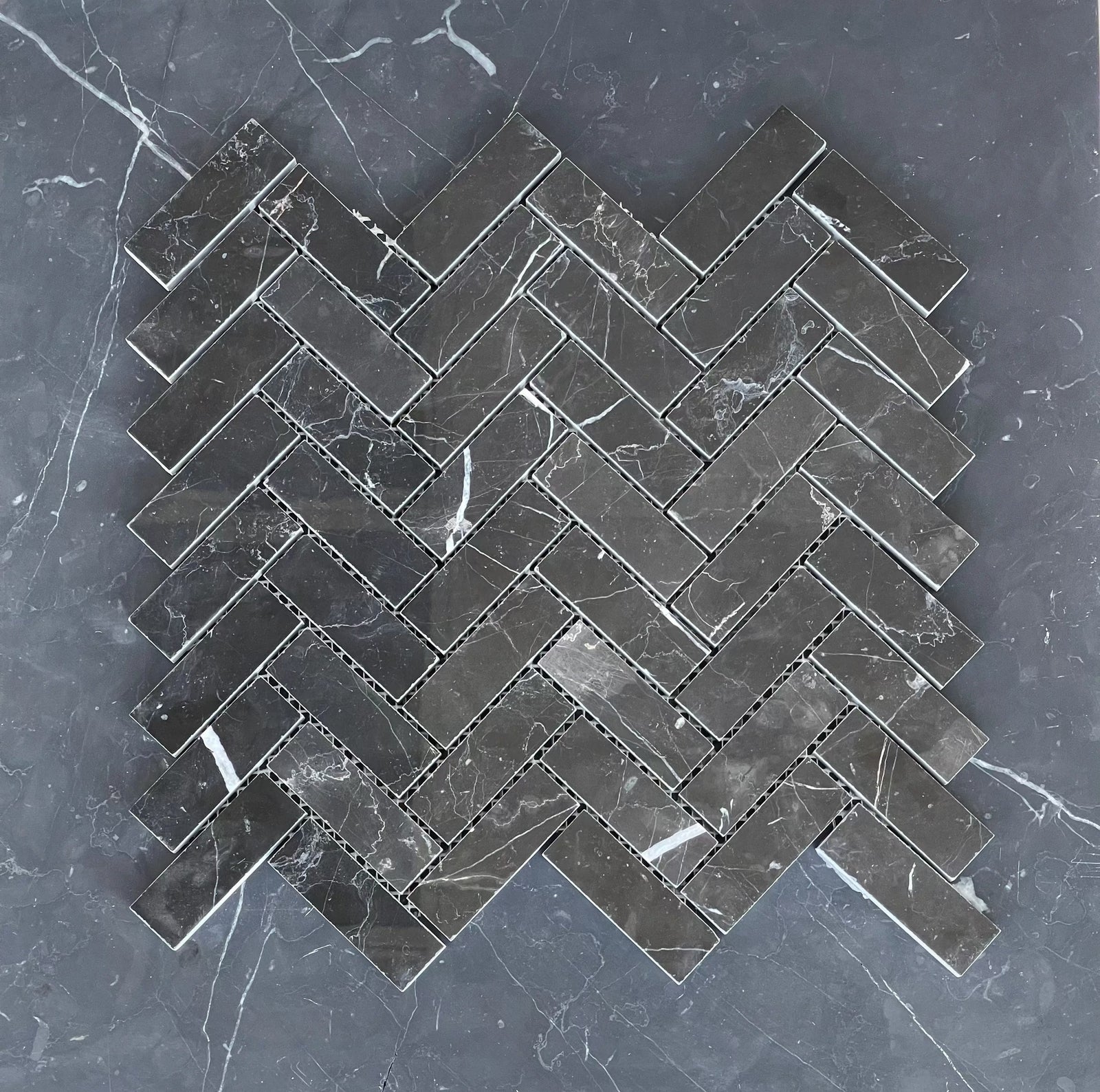 Nero Marquina Marble 1x3 Herringbone Mosaic tile in deep black with white veining; polished/honed finish by Tilehouz